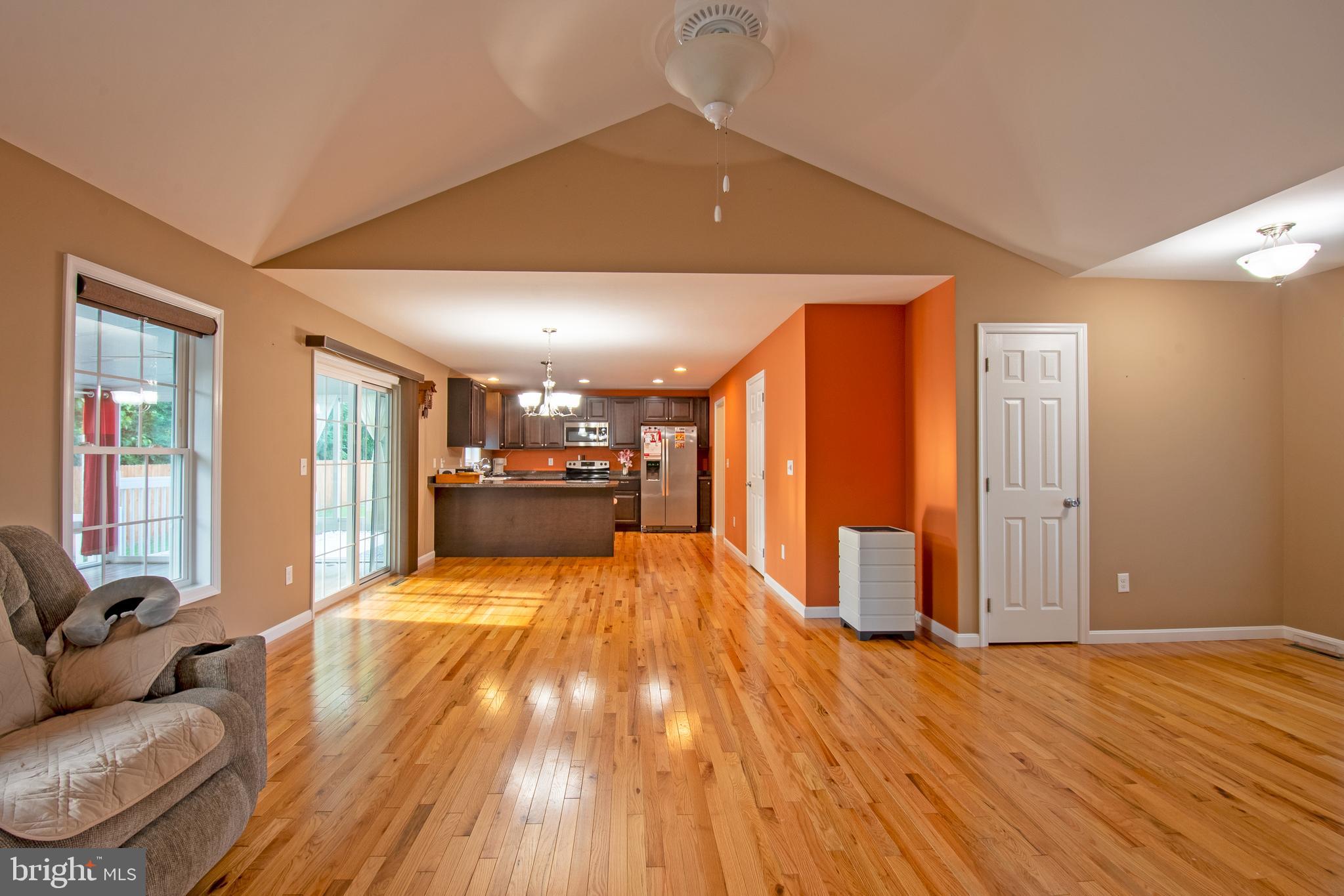 54 Minner Street Houston, DE 19954 - Photo 22 of 55 a view of a livingroom with furniture wooden floor and windows