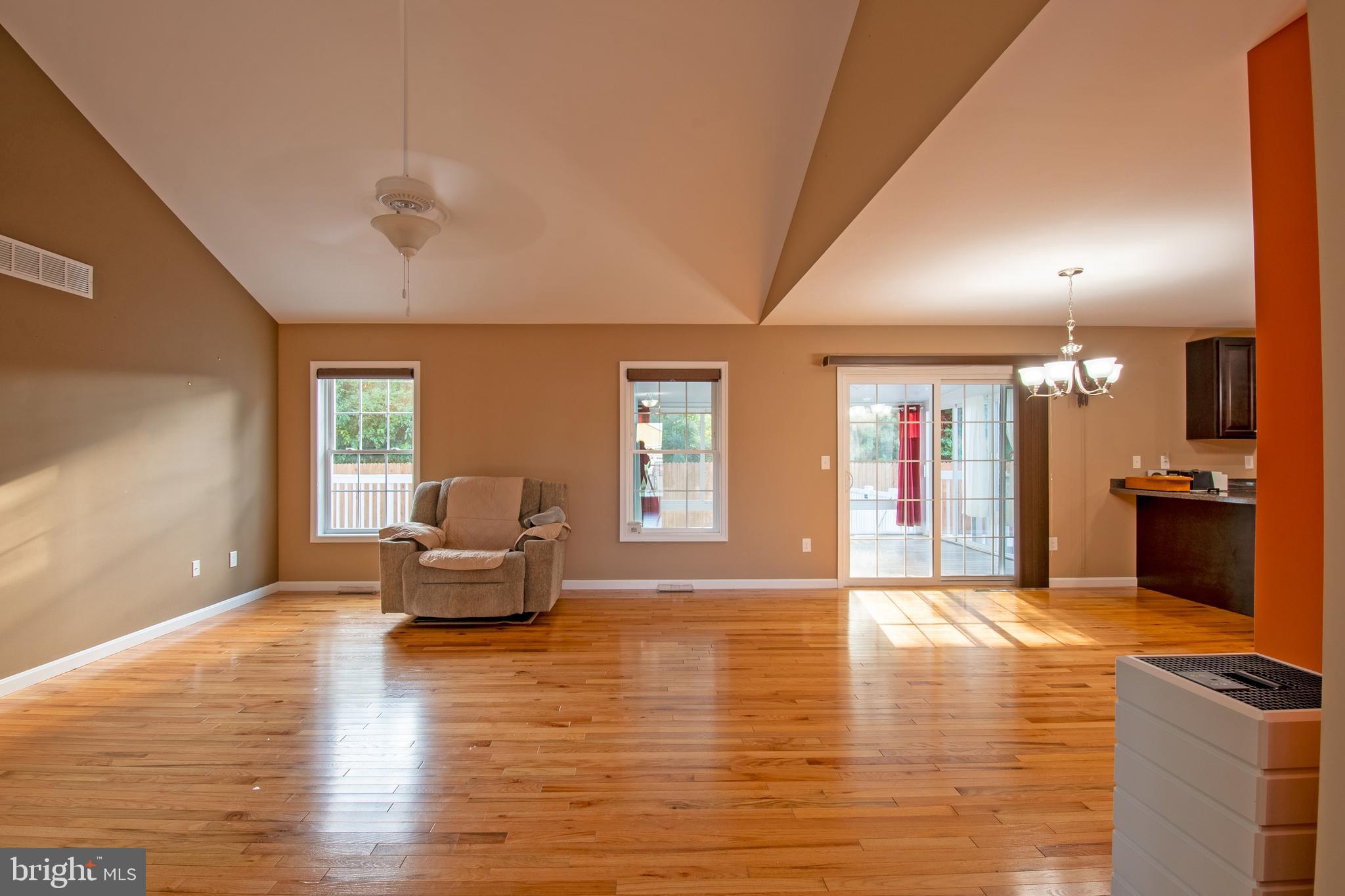 54 Minner Street Houston, DE 19954 - Photo 23 of 55 a living room with furniture and wooden floor
