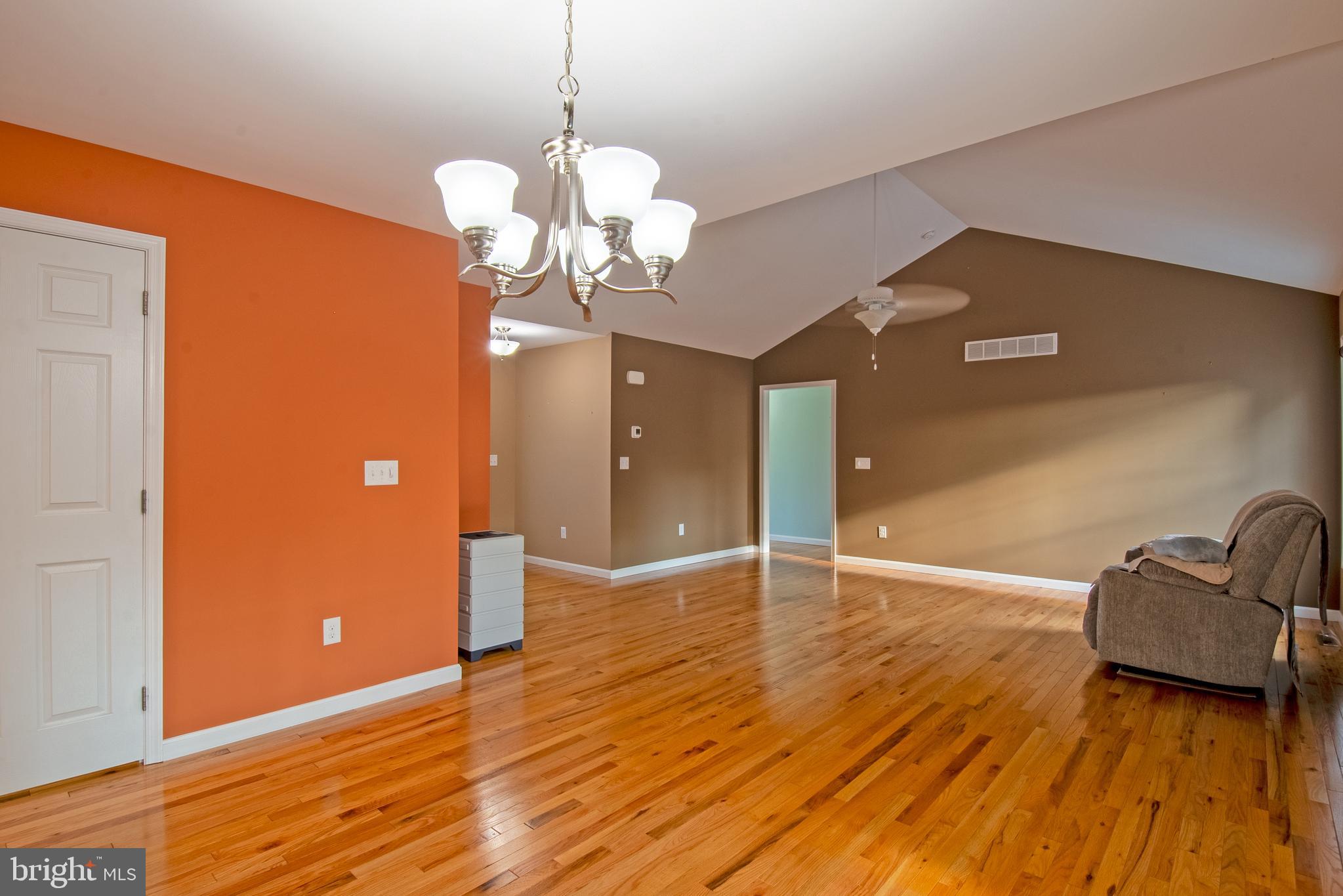 54 Minner Street Houston, DE 19954 - Photo 25 of 55 a view of a livingroom with a chandelier
