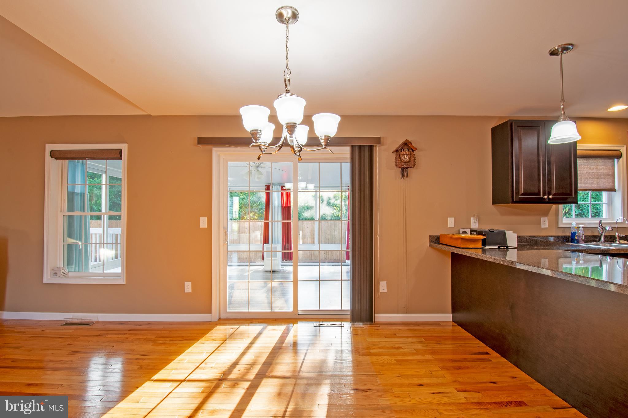 54 Minner Street Houston, DE 19954 - Photo 27 of 55 a view of a kitchen with a sink dishwasher and wooden floor