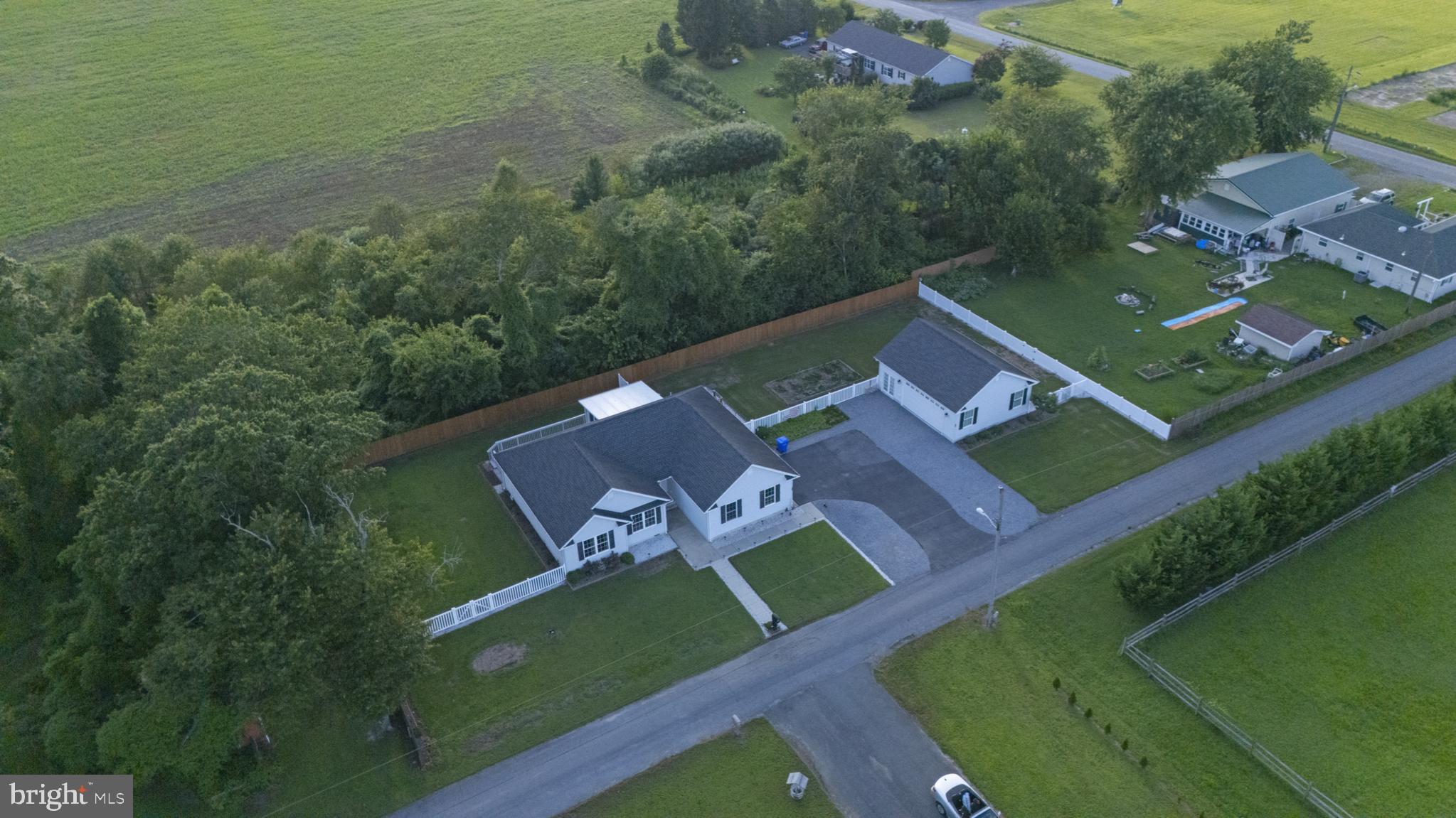 54 Minner Street Houston, DE 19954 - Photo 44 of 55 an aerial view of a house with a garden