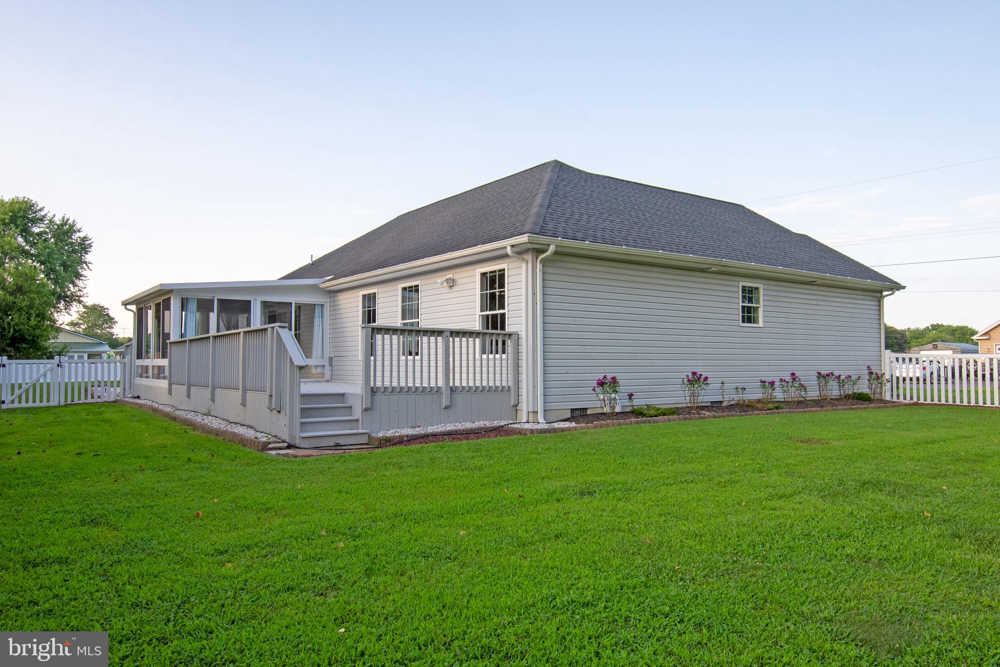 54 Minner Street Houston, DE 19954 - Photo 9 of 55 a view of a house with a yard and sitting area