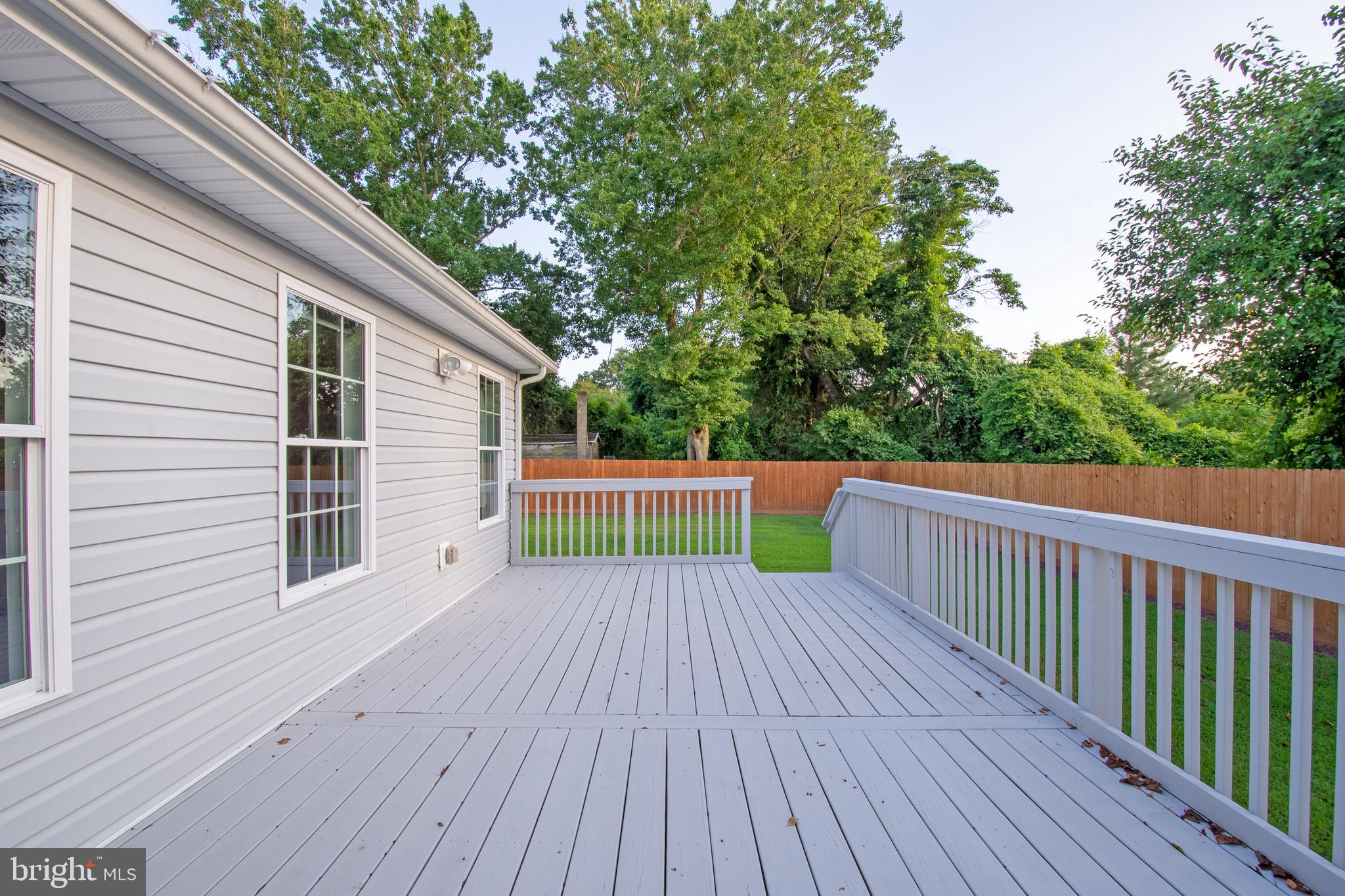 54 Minner Street Houston, DE 19954 - Photo 10 of 55 a view of a backyard with wooden floor