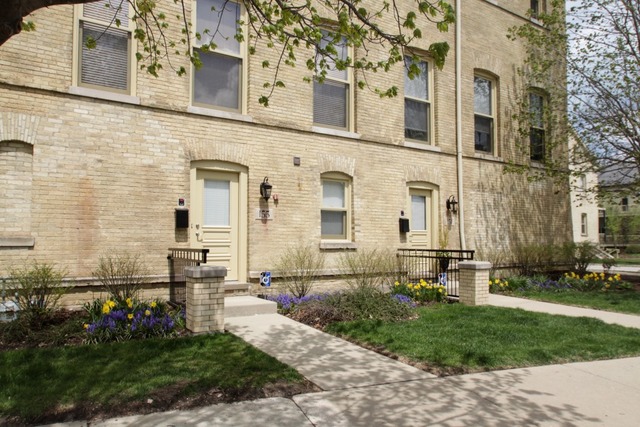 155 Whistler Road Highland Park, IL 60035 - Photo 1 of 13 front view of a building with a yard