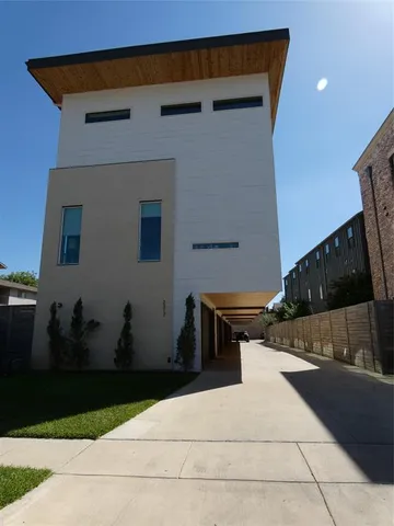 a patio with table and chairs