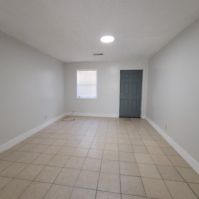 2406 Dawson Street, Unit 2 Columbus, GA 31903 - Photo 3 of 10 an empty room with windows