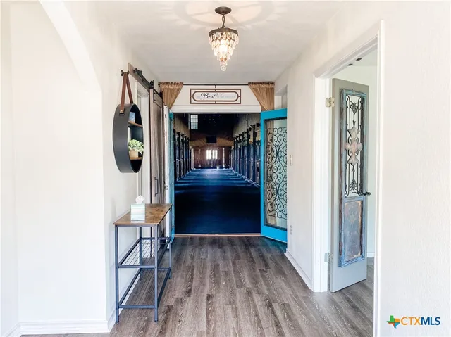 a utility room with sink dryer and washer