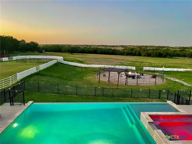 a view of a golf course with a lake