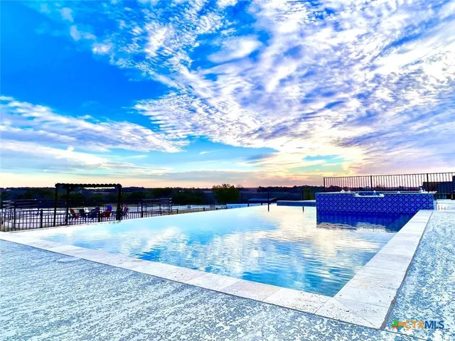 a view of a couches with wooden floor
