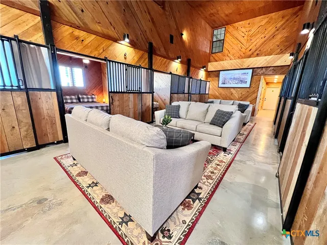 a white refrigerator freezer and a stove sitting inside of a kitchen