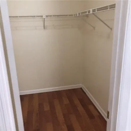 a view of a room with racks on the wall