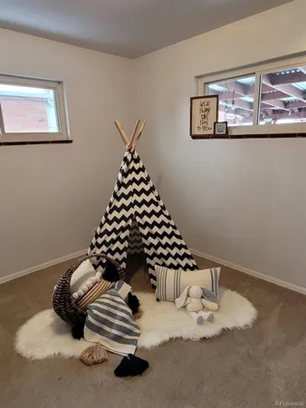 a bed room with a bed and a couch