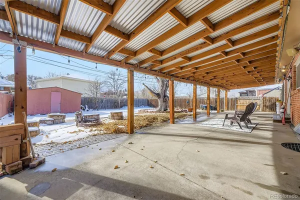 a view of a garage with wooden roof
