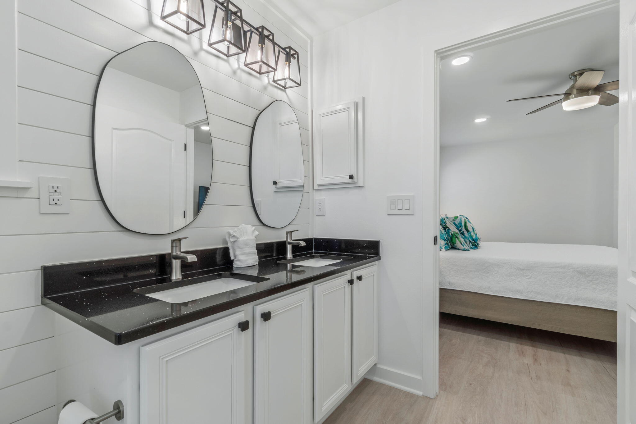 223 Sandy Cay Drive Miramar Beach, FL 32550 - Photo 27 of 79 a bathroom with a double vanity sink and a mirror