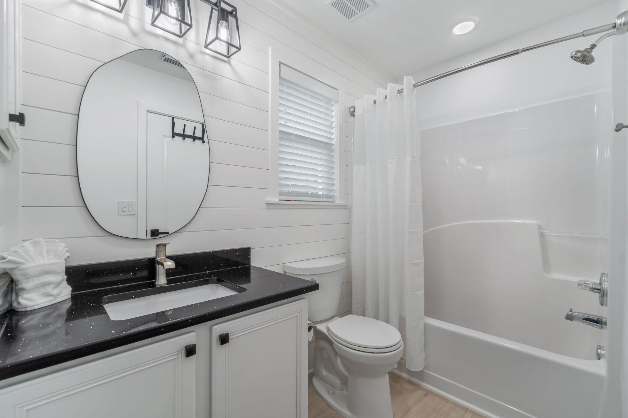 223 Sandy Cay Drive Miramar Beach, FL 32550 - Photo 37 of 79 a bathroom with a sink a toilet a mirror and shower