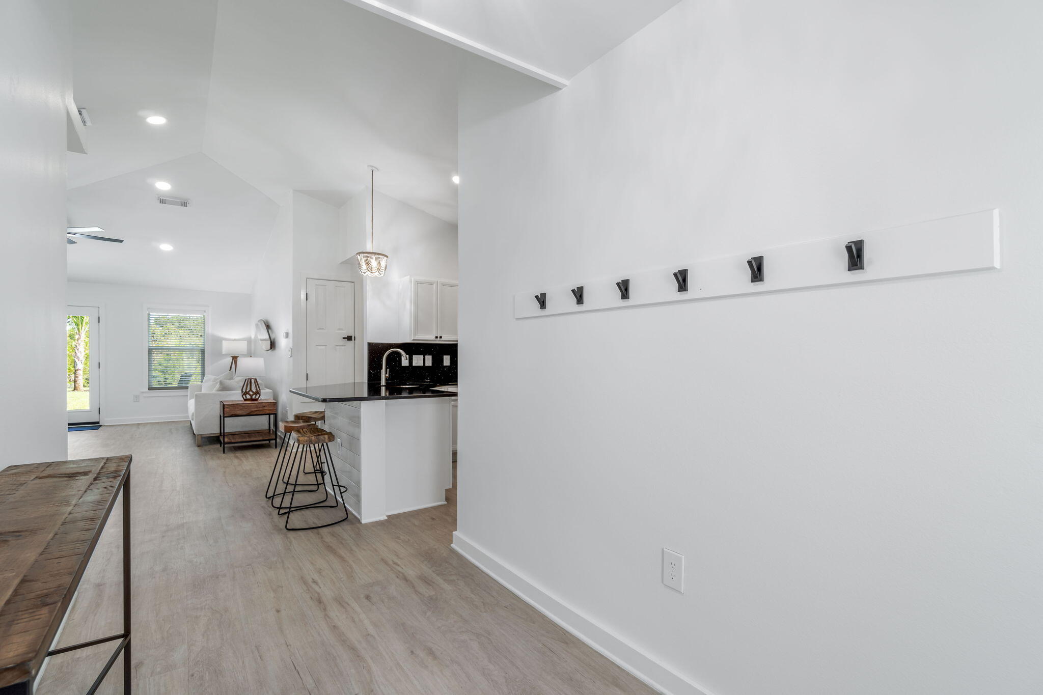 223 Sandy Cay Drive Miramar Beach, FL 32550 - Photo 49 of 79 a living room with furniture and a wooden floor