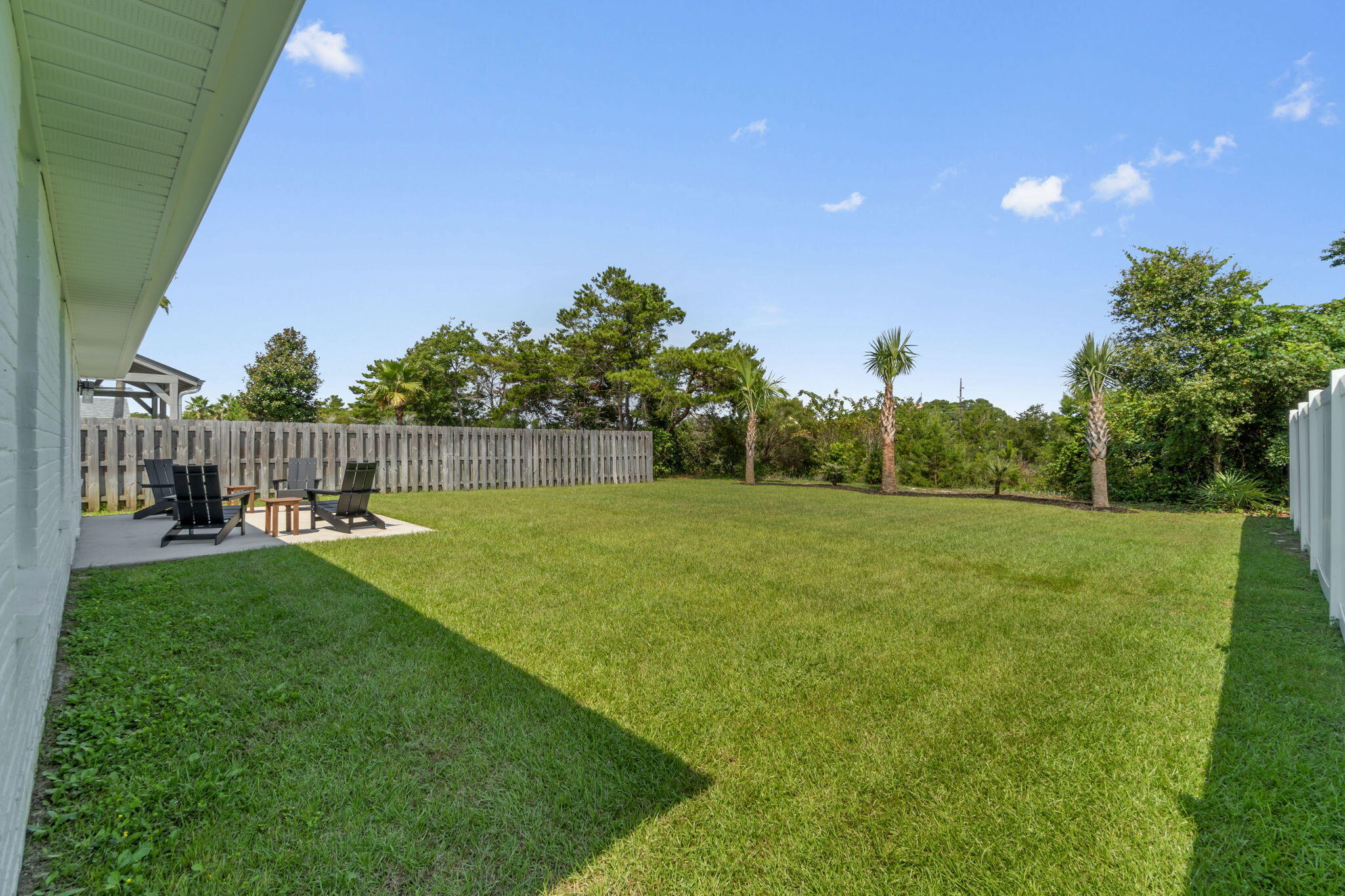 223 Sandy Cay Drive Miramar Beach, FL 32550 - Photo 54 of 79 a view of backyard with swimming pool and green space
