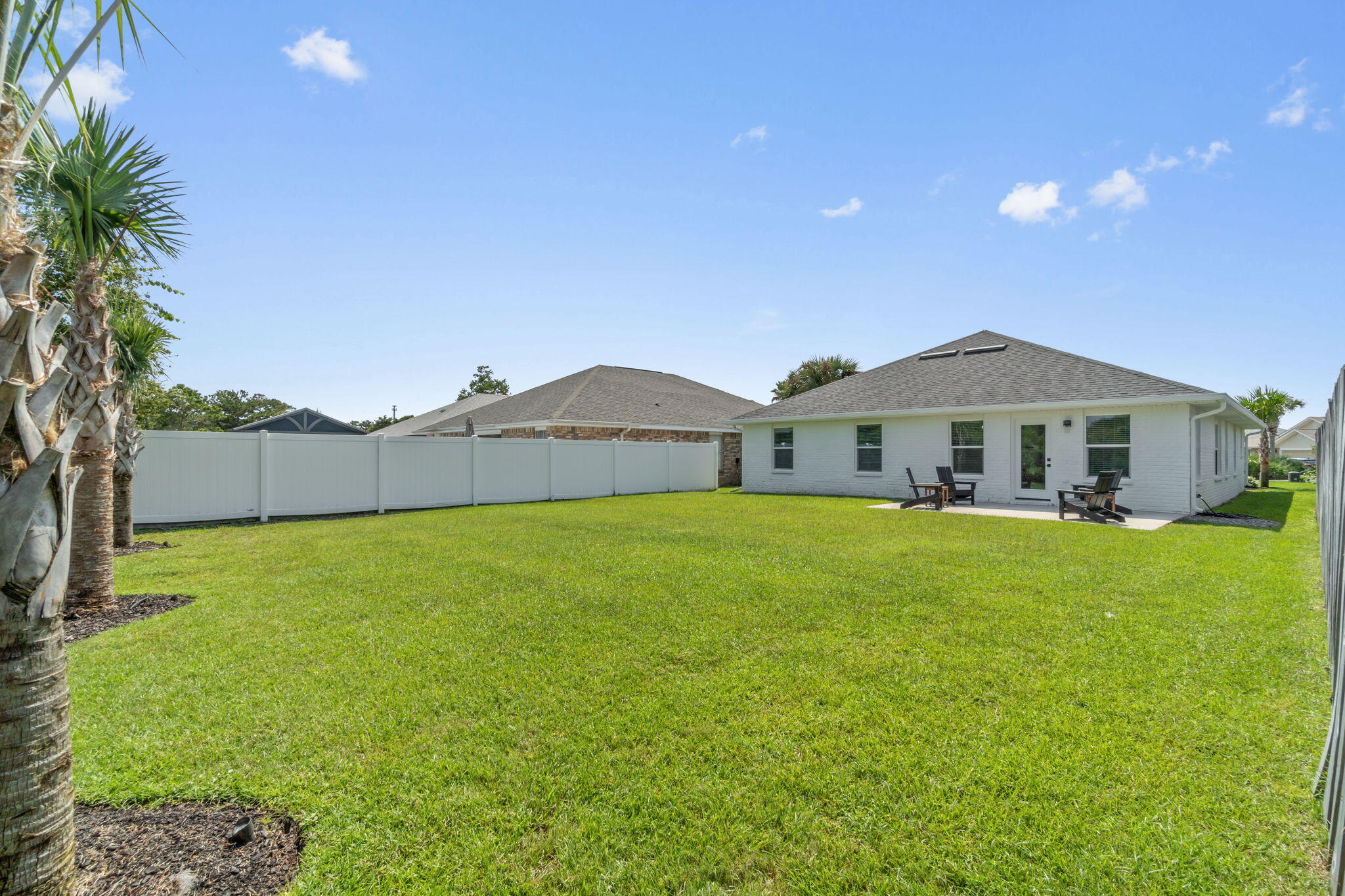223 Sandy Cay Drive Miramar Beach, FL 32550 - Photo 55 of 79 a front view of a house with garden