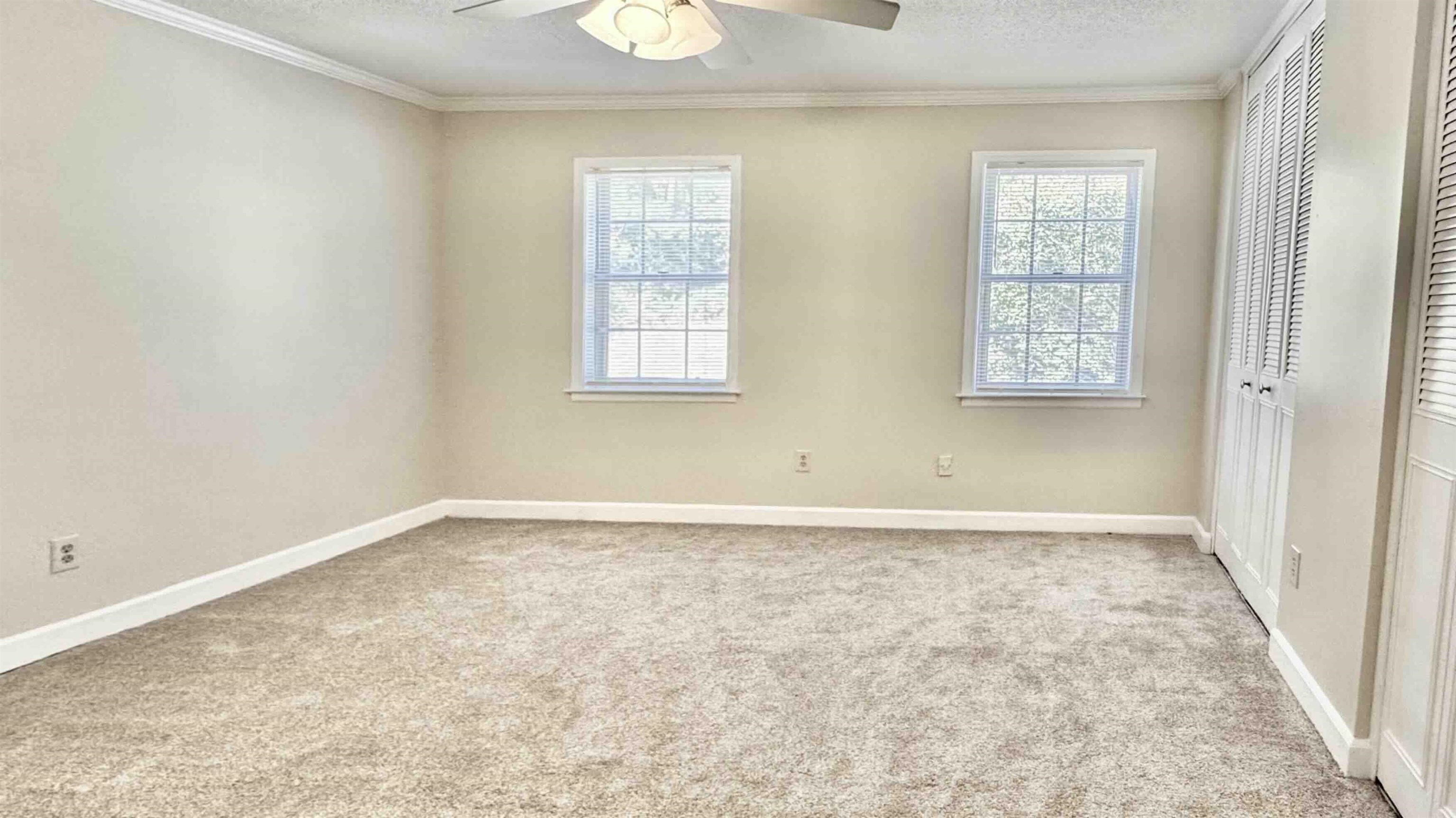 5718 Quince Road, Unit 10 Memphis, TN 38119 - Photo 13 of 28 an empty room with windows