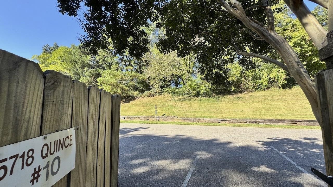 5718 Quince Road, Unit 10 Memphis, TN 38119 - Photo 25 of 28 a view of a yard with a tree