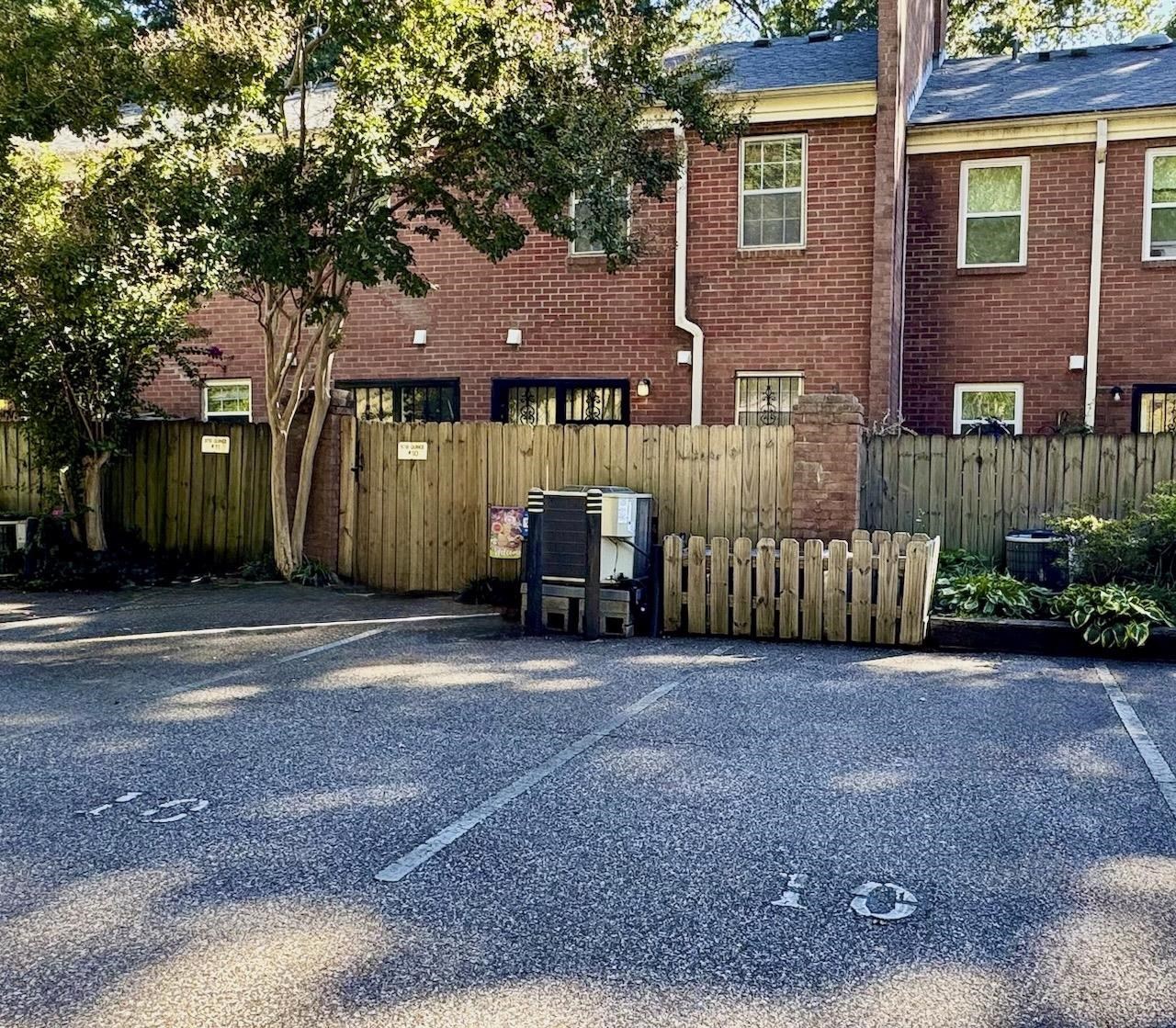 5718 Quince Road, Unit 10 Memphis, TN 38119 - Photo 26 of 28 a house view with a garden space