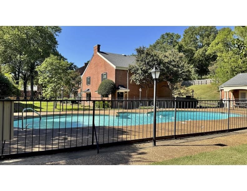 5718 Quince Road, Unit 10 Memphis, TN 38119 - Photo 28 of 28 a view of a backyard with a small garden