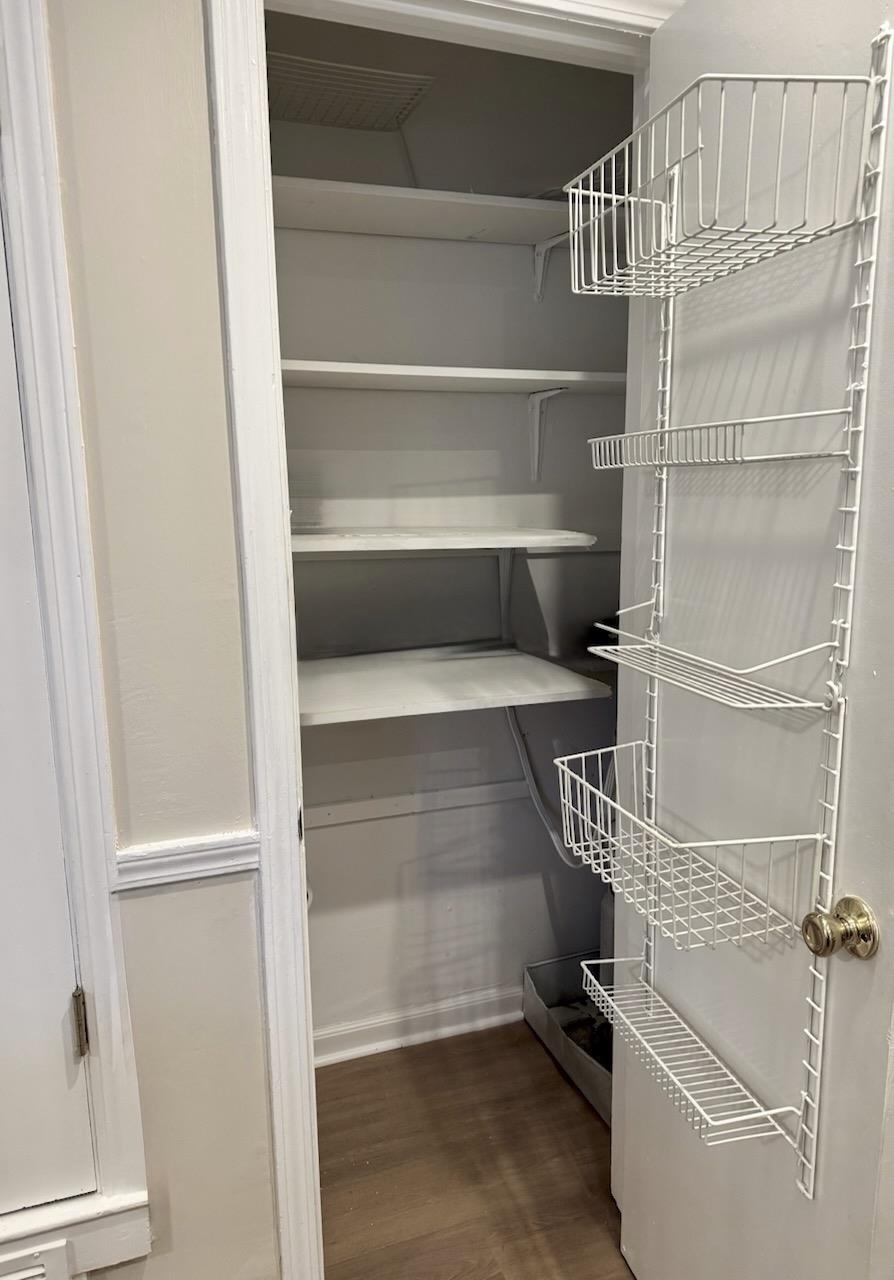 5718 Quince Road, Unit 10 Memphis, TN 38119 - Photo 9 of 28 a view of walk in closet with empty racks