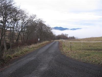 2005 Butler Creek Road Ashland, OR 97520 - Photo 5 of 15 a view of a road with mountains in the background