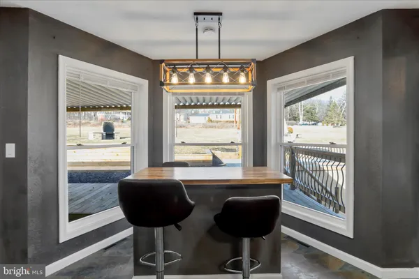 a view of a room with furniture window and outside view