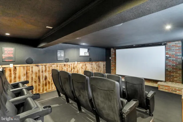 a projector room with a projector and a chair