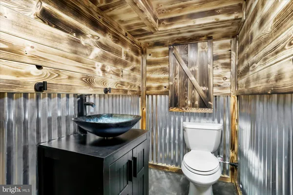 a bathroom with a toilet and a sink