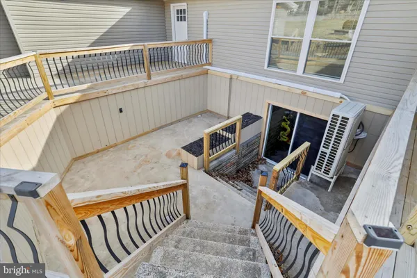 a view of a balcony with car parked