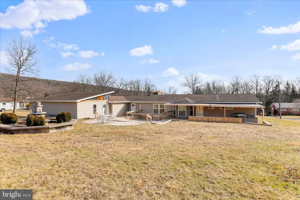 a view of a terrace with trees