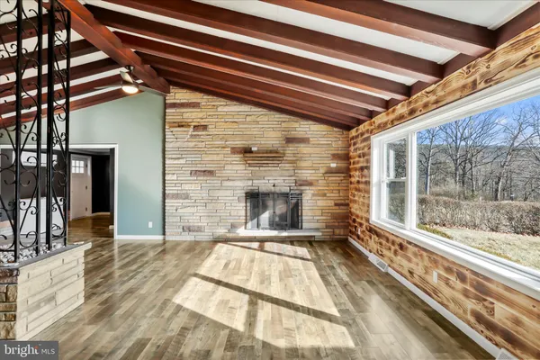 a view of an entryway with a fireplace