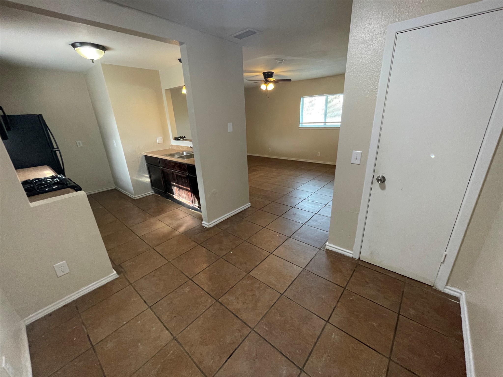 6253 Manor Road, Unit B Austin, TX 78723 - Photo 3 of 10 Dining area open to kitchen and living room.