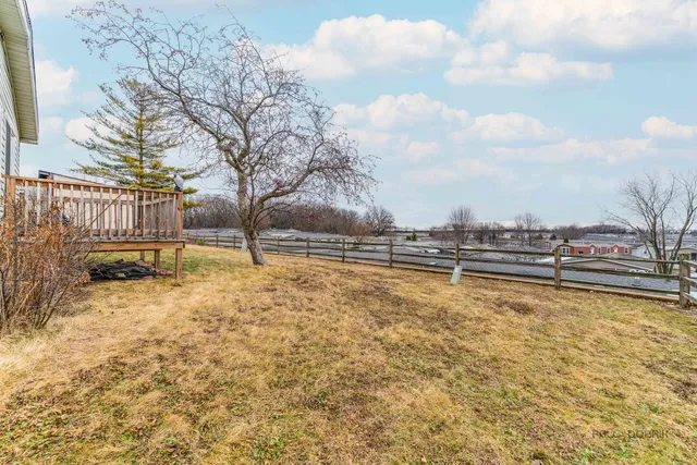 a view of swimming pool with outdoor seating