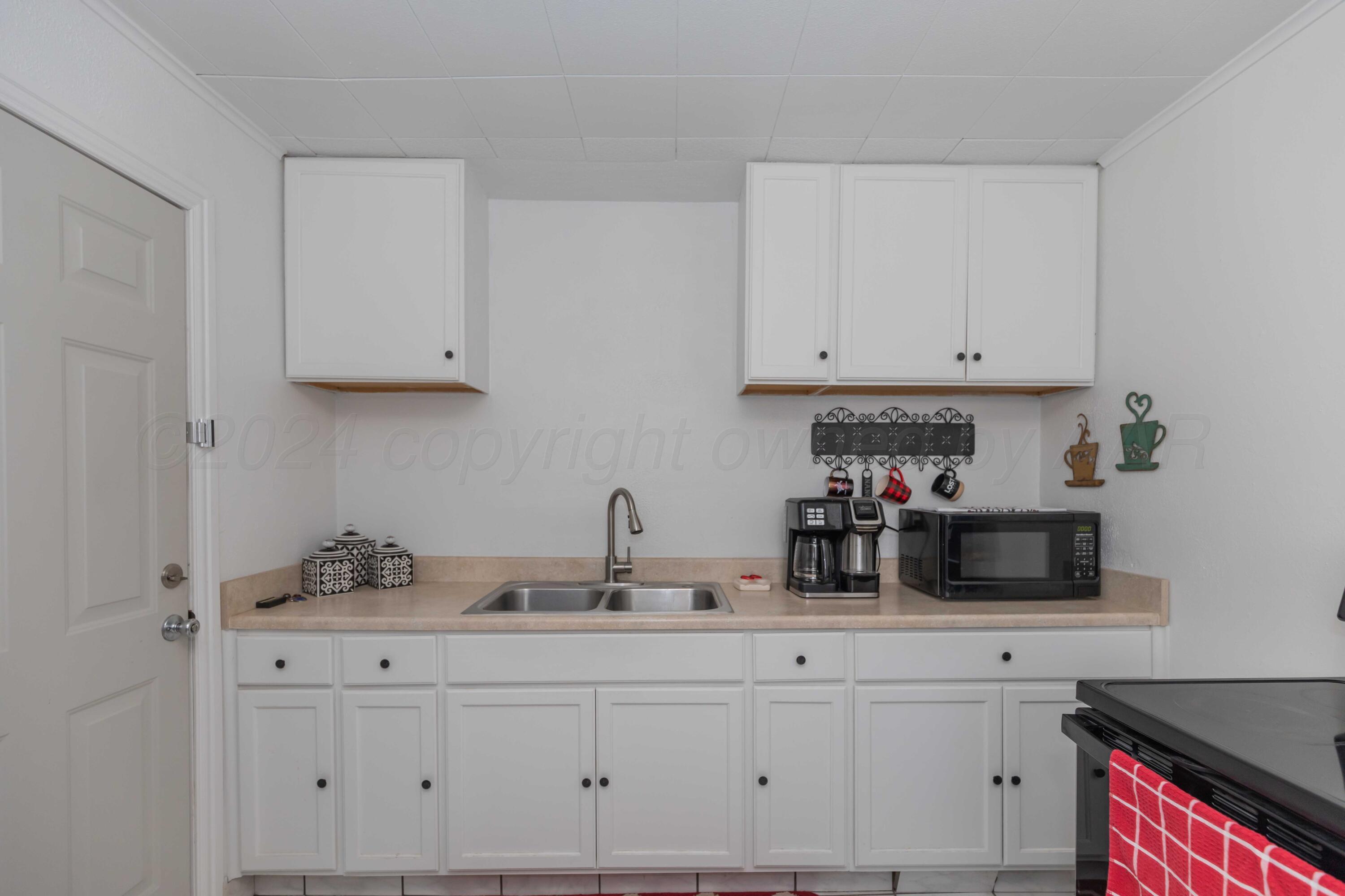 4313 Bowie Street Amarillo, TX 79110 - Photo 8 of 25 KITCHEN VIEW 2