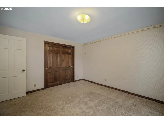 a view of livingroom with furniture and staircase