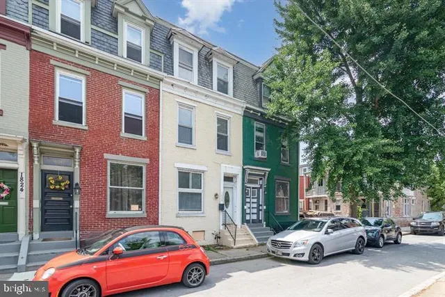 a cars parked in front of a building