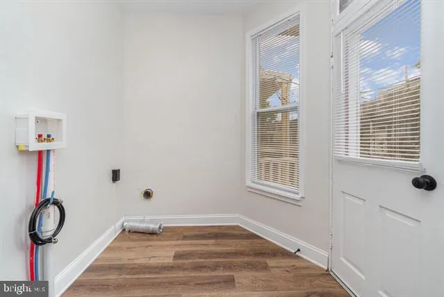 a bathroom with a bathtub and a toilet