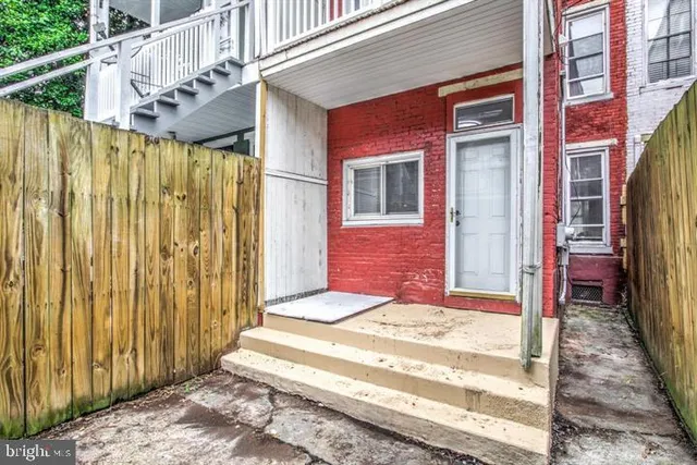 a view of a wooden fence