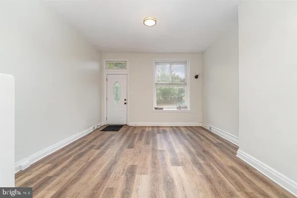 an empty room with window