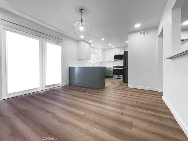 a view of kitchen and microwave