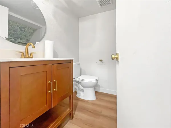 a bathroom with a toilet and a sink