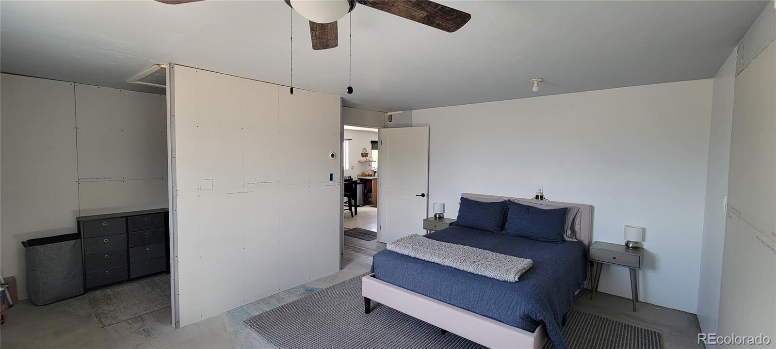 8246 Manitou Springs Road Blanca, CO 81123 - Photo 15 of 43 a living room with furniture