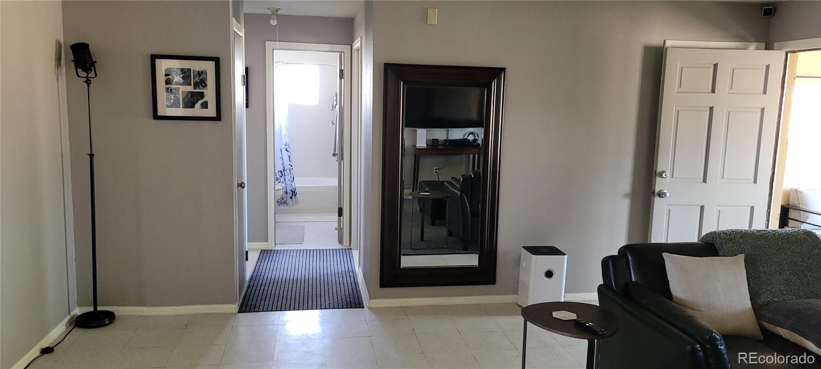 8246 Manitou Springs Road Blanca, CO 81123 - Photo 25 of 43 a view of a hallway with closet and front door