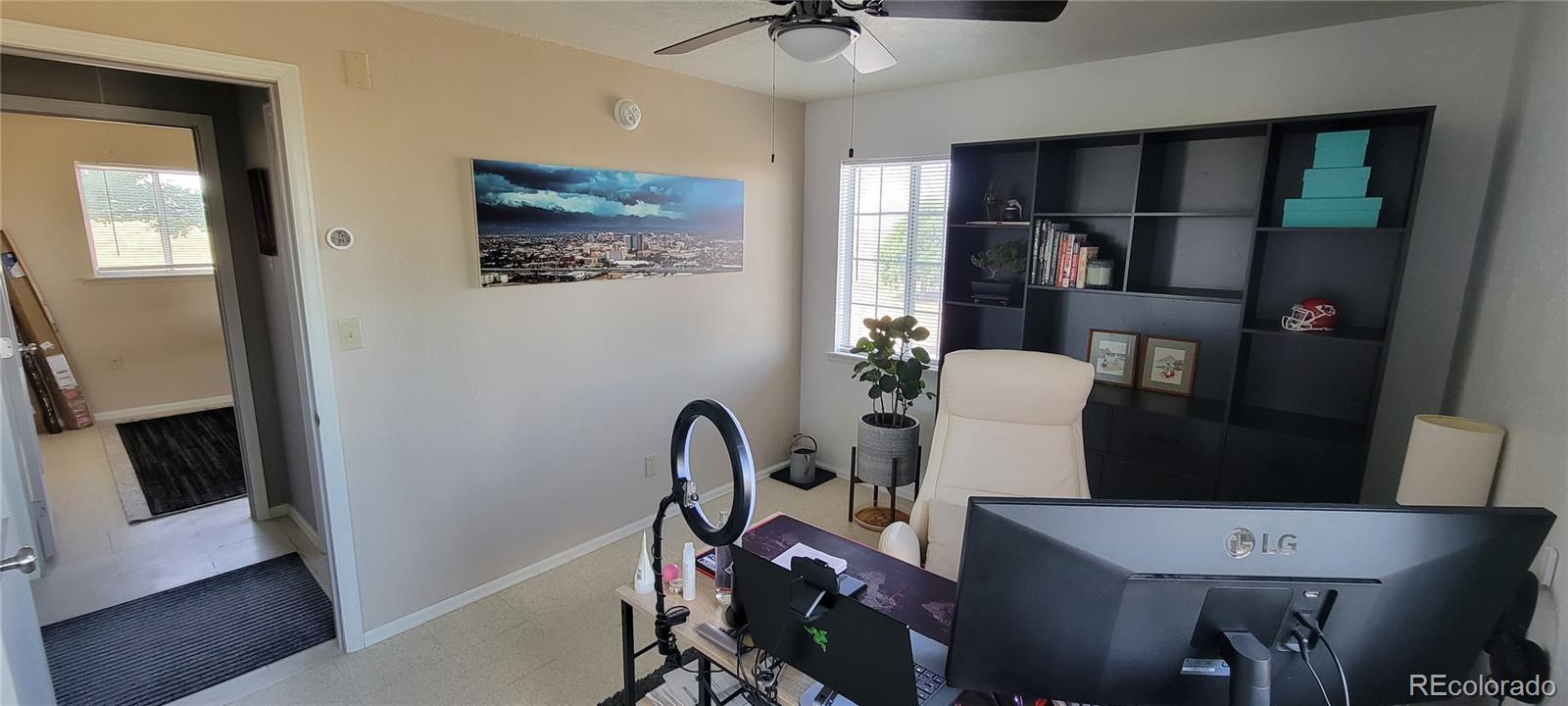 8246 Manitou Springs Road Blanca, CO 81123 - Photo 29 of 43 a view of a workspace with furniture and bathroom