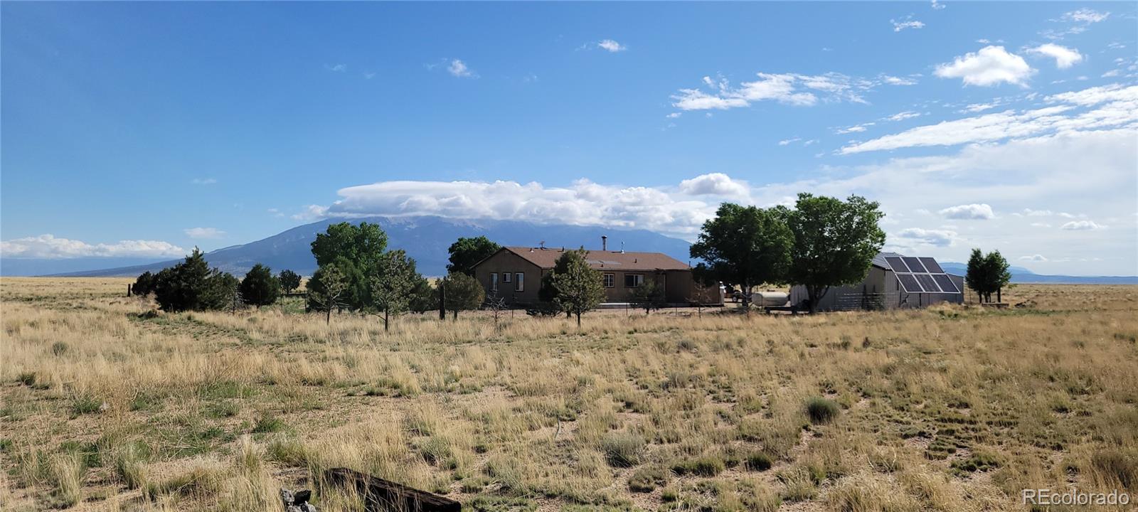 8246 Manitou Springs Road Blanca, CO 81123 - Photo 43 of 43 a view of a yard covered in snow
