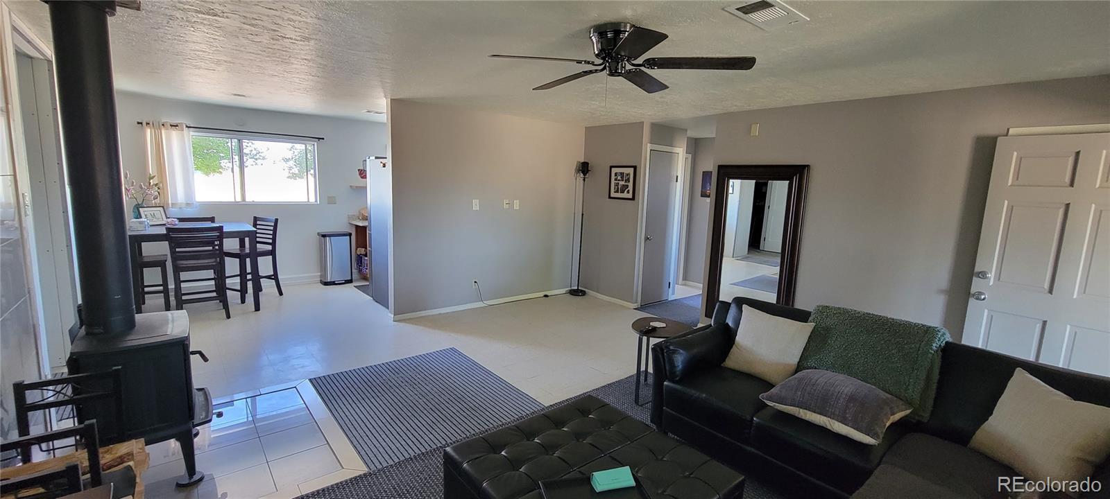 8246 Manitou Springs Road Blanca, CO 81123 - Photo 8 of 43 a living room with furniture and wooden floor