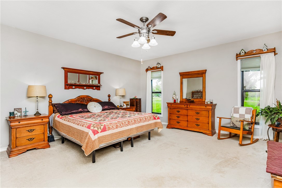 345 Trail Ridge Drive Sandia, TX 78383 - Photo 26 of 40 a bedroom with a bed and a table in it